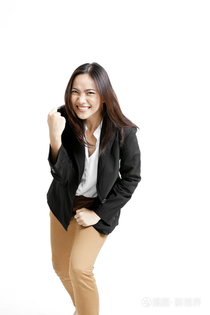 成功的年轻商业女人为她的成功感到高兴