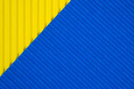 蓝色和黄色波纹纸纹理, 用于背景。具有复制空间的生动色彩, 用于添加文本或对象