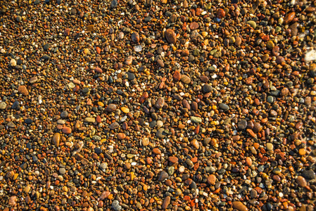 海滩上的卵石石头特写镜头