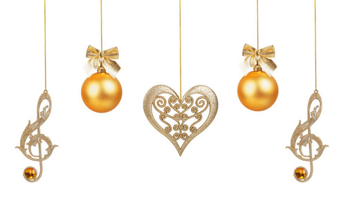 金色高音谱号, 心和圣诞球挂在黄金上