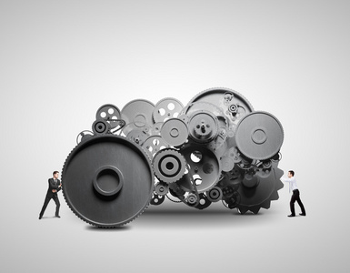 男孩推的齿轮杠杆推动大齿轮的等距业务团队3d白种人推齿轮推动齿轮