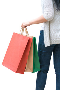 在白色背景, 消费主义, 销售和人的概念查出的购物妇女藏品袋
