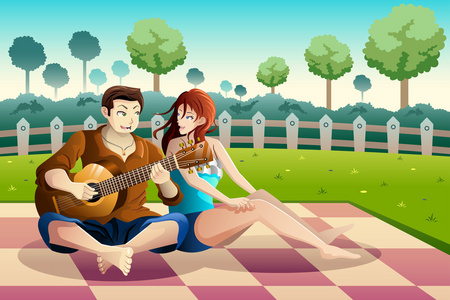 夫妇一起在公园里的吉他