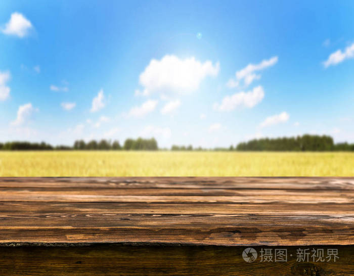 自然背景模糊的空木桌照片 正版商用图片07rqgx 摄图新视界 自然背景模糊的空木桌照片 正版商用图片07rqgx 摄图新视界