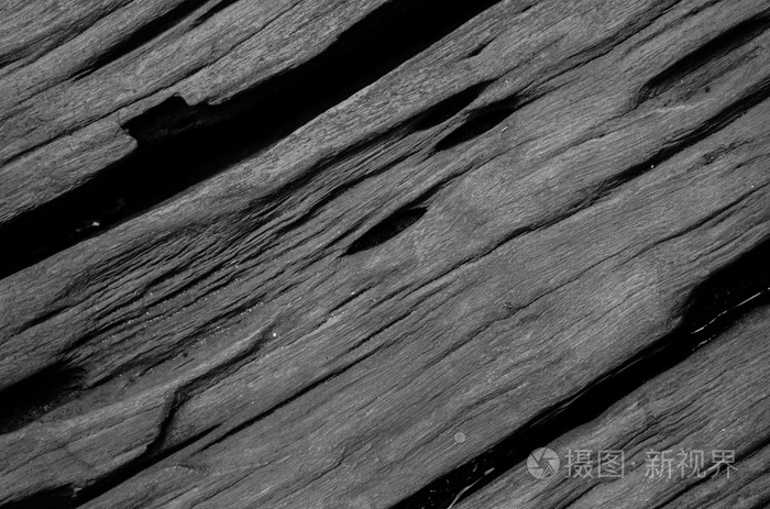 裂纹黑色和白色的硬木板背景