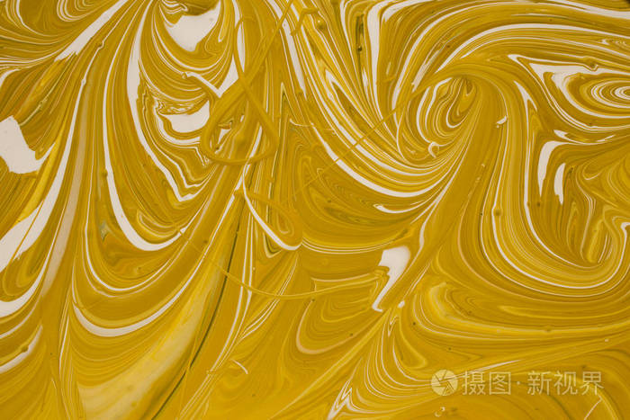 制造油漆复合色的照片用不同颜色混合丙烯酸颜料marbleized