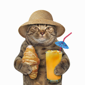 猫用羊角面包和果汁图片