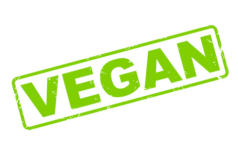 素食主义者邮票邮票与白底绿字的素食主义者照片