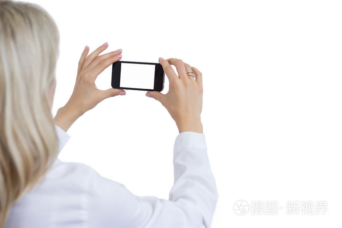 女人用手机拍照孤立的白色背景为您自己的图像的