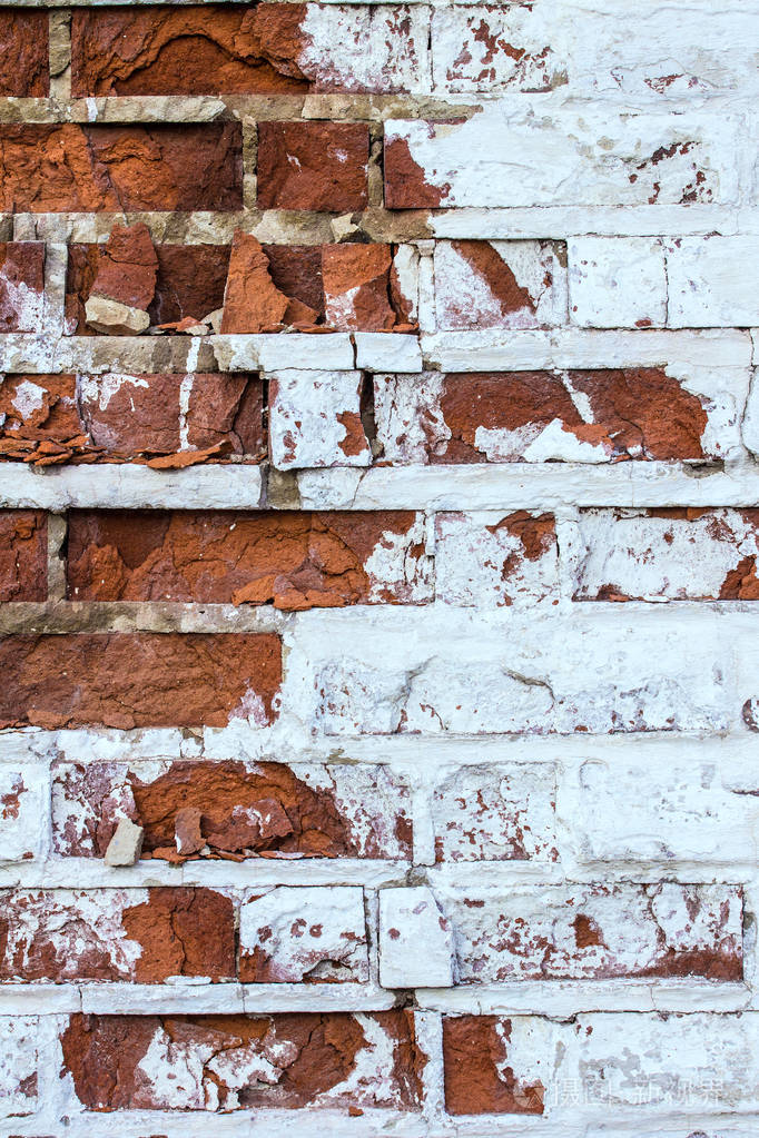 一堵旧砖墙的一部分旧的白色和红色砖墙的纹理