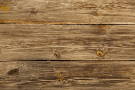 深棕色木板。木制的背景
