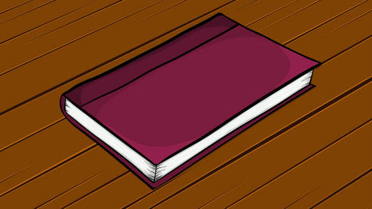 动画片闭合的书躺在木桌上