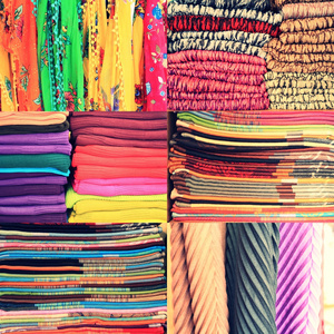 纺织材料在堆栈中的一套。色彩鲜艳的布的图像集合。不同颜色的织物，大集