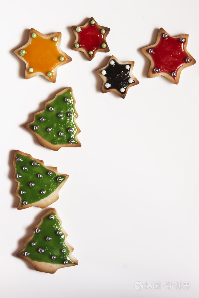 圣诞节手工饼干,星星在白色背景照片-正版商用图片088hpd-摄图新视界