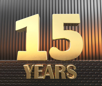 金黄数字十五数字15和词岁月反对金属长方形平行六面体的背景在日落的