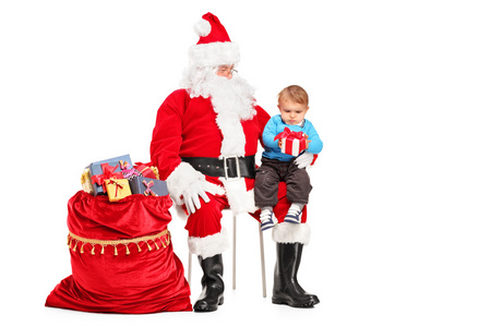 圣诞老人和礼物的孩子图片