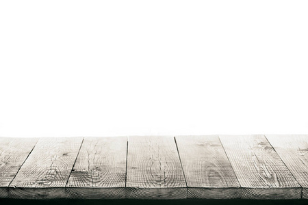 在白色的背景中分离的木桌