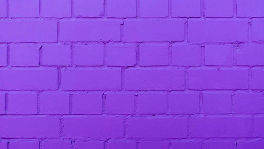 画紫色的砖墙的背景或纹理图片