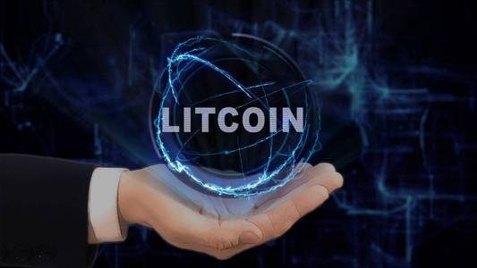 画的手显示概念全息图 Litcoin 在他的手上