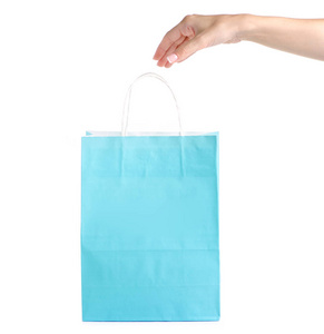 蓝色绿松石纸包袋在手店购物时尚