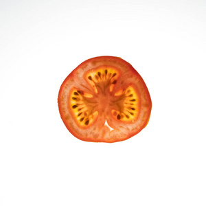 西红柿切片从后面点燃图片
