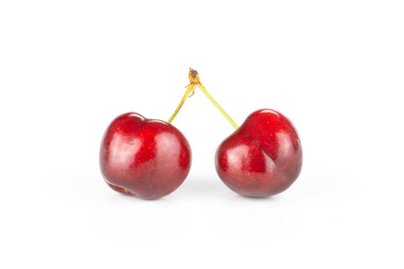 两个整体甜明亮的红樱桃组合茎分离照片