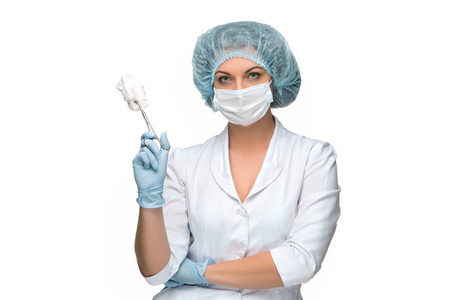 女外科医生手术器械缓缴白色背景画像