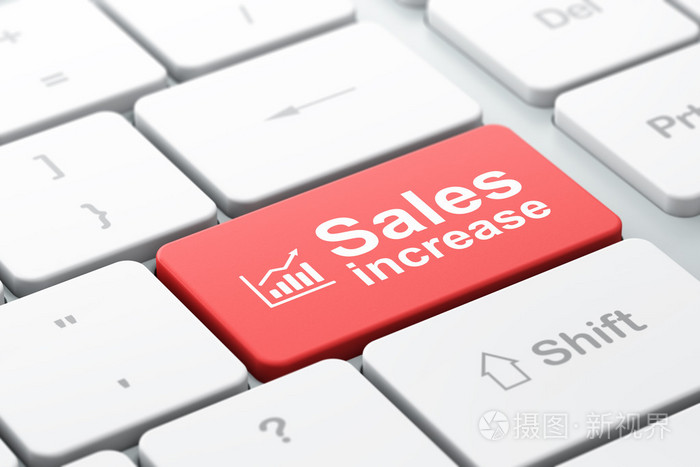 营销理念 计算机键盘背景上的增长图和销售
