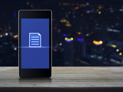 现代智能手机屏幕上的文档图标在模糊五颜六色的夜灯城市塔和摩天大楼, 技术互联网通信概念