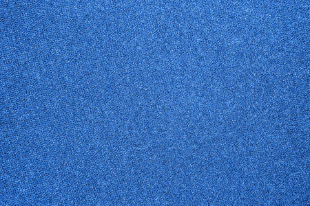 地毯的质地是蓝色的.蓝色地毯的背景照片