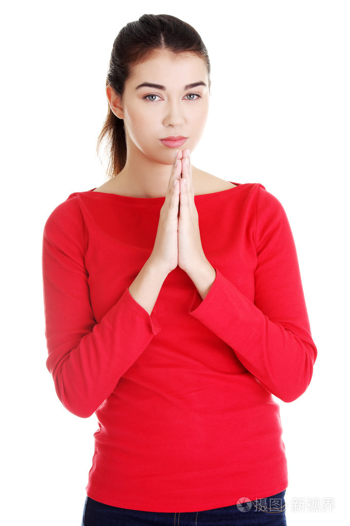 祈祷的年轻白人女子肖像