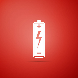 在红色背景上隔离的电池图标.平面设计.矢量插图照片