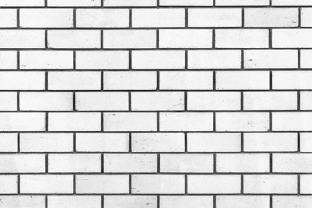 白色纹理的墙壁从一个天然的白色砖与小裂缝和芯片, 建筑特写抽象背景