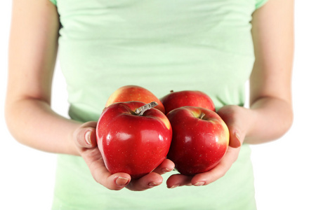 女人抱着红苹果，白色背景上孤立