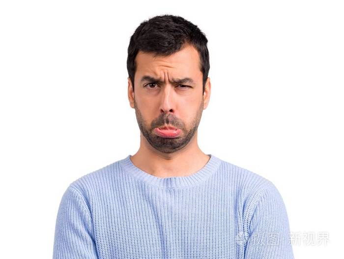 穿着蓝色毛衣的男人, 表情悲伤和沮丧.严肃的手势