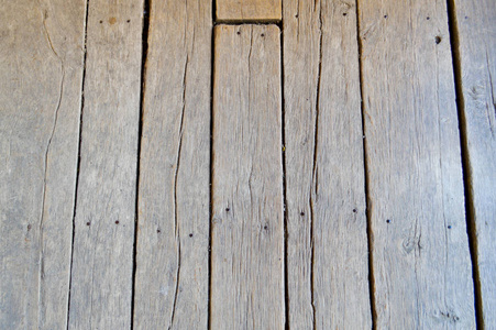 木质未漆旧板与接缝, 裂纹和钉子帽。的背景