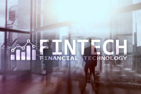 Fintech金融技术, 全球商务和信息互联网通信技术。摩天大楼背景。高新技术企业理念