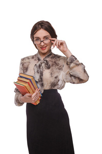 眼镜与书籍孤立的白色背景的女老师