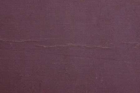 一本书封面上旧纸板的红纸纹理