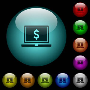 笔记本电脑与美元符号图标在彩色照明球形玻璃按钮黑色背景。可用于黑色或深色模板