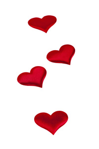 四个红色的心情人节符号上白色背景特写