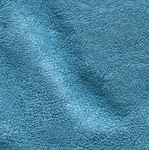 蓝色的皮革质地，在皮革上的凹痕