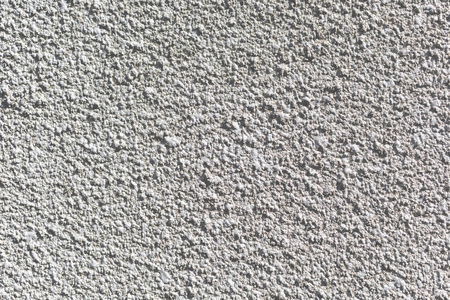 墙上灰色水泥和混凝土喷淋的背景