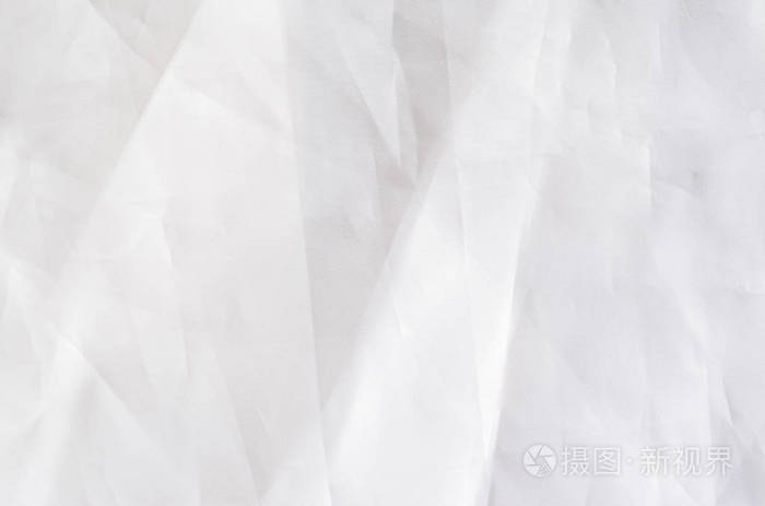 白色合成衬里织物与褶皱.皱巴巴的床单或衣服背景