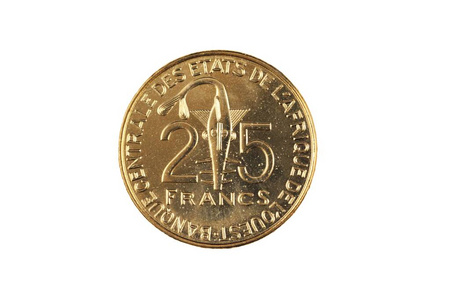 在白色背景查出的25西非法郎硬币特写图像