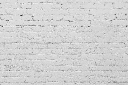 白色彩绘砖墙的抽象质感