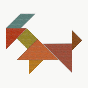 一个欢快的狗奠定了从七巧板的拼图碎片, 木本纹理照片