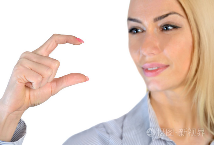 女人用手指拿着的东西照片-正版商用图片09egqy-摄图新视界