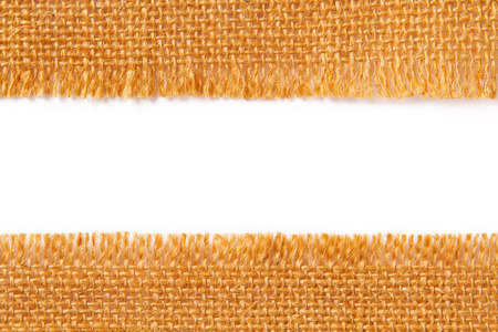 边境解雇布,撕开的粗麻布粗报废边缘撕裂亚麻织物照片