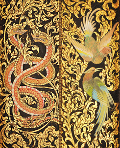 在庙门上的传统泰式风格绘画